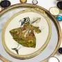 Л.С.Бакст. Эскиз костюма девочки в зеленом платье к балету «Лавка чудес», 1919 в раме «Бетти»